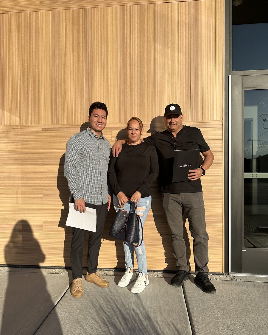 Ishmael Villarroel with clients in West Jordan, 2023