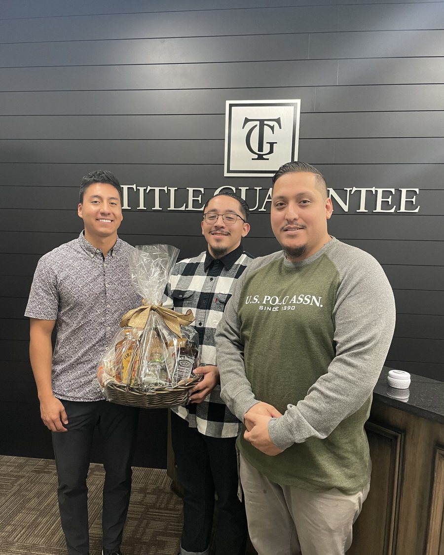 Ishmael Villarroel with clients in West Valley City, 2021